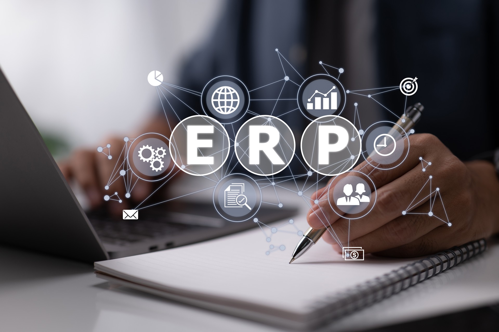 An IT manager studies ERP (Enterprise Resource Planning) architecture.